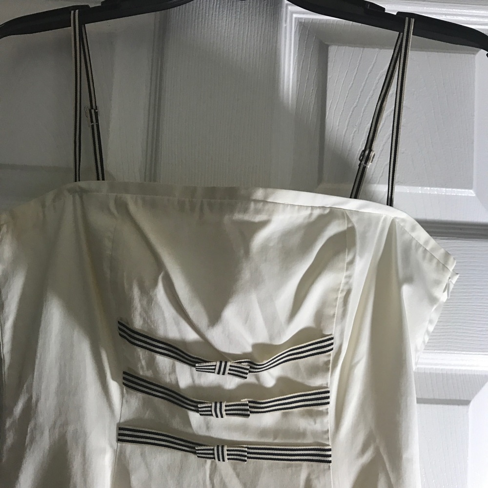 White sleeveless dress with black & cream ribbons